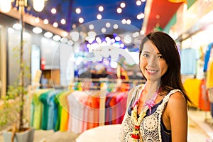 Woman in night street market