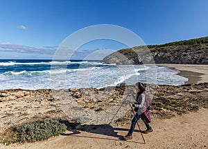 Woman Nordic Walking at Cala Torta