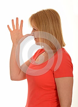 Woman nose snub gesture