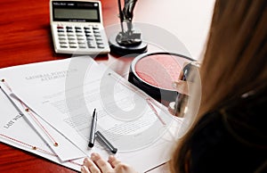 Woman notary public notarize document