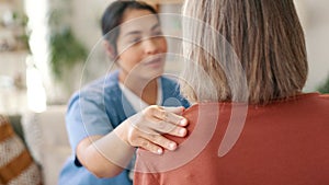 Woman, nurse and consulting in elderly care, support or trust for healthcare, advice or comfort at old age home. Female