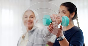 Woman, nurse and dumbbell in elderly care for physiotherapy, exercise or workout at old age home. Female doctor