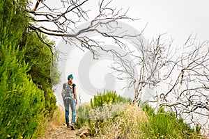 Woman in obscure mountains