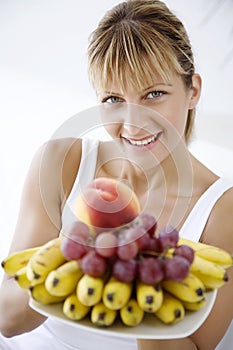 Woman offering fruit