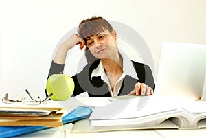 Woman in office with apple