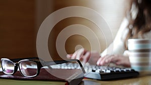 Woman in the office at the computer