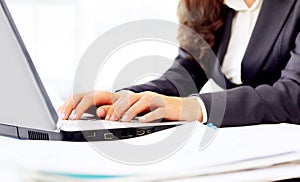 Woman in the office, work at the computer,