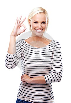 Woman, OK hand gesture and portrait with smile, support and success with feedback or vote on white background. Like