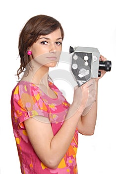 Woman with old movie camera