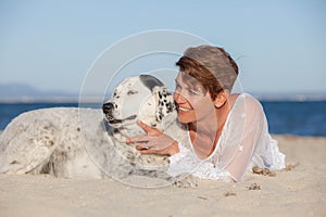 Woman with old pet mongrel dog