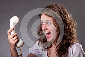 Woman with old phone