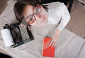 Woman with old typewriter