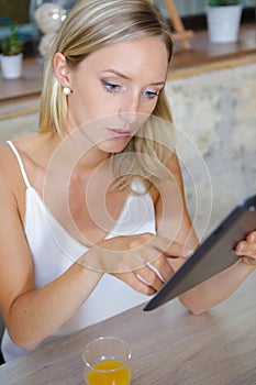 Woman in oline dating on public internet point photo