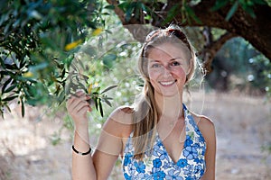 Woman with olive trees