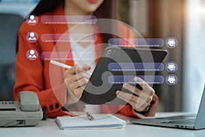 Woman online chatting with AI chat bot on tablet. Artificial intelligence robot innovation technology communicate and answer