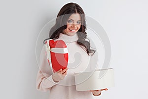 Woman open heart shaped box