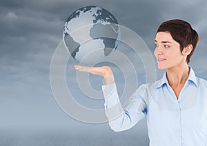 Woman with open palm hand under world earth globe