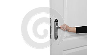 Woman opening light wooden door isolated on white