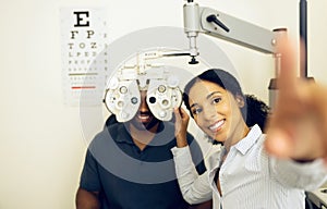 Woman, optometrist or optical equipment for eye testing, optometry or doctor for exam, assessment or vision. Healthcare
