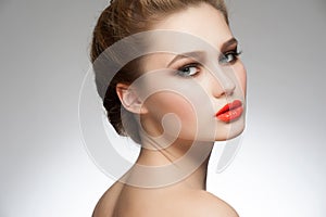 Woman with orange lipstick photo
