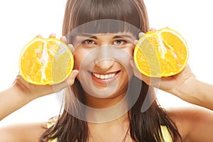 Woman with oranges in her hands