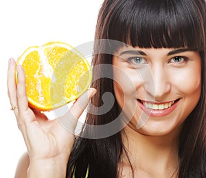 Woman with oranges in her hands