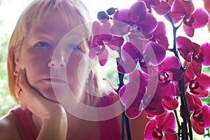 Woman with orchid