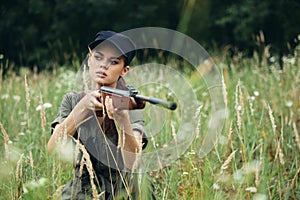 Woman on outdoor Hunting for shelter with weapons