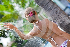 Woman in outdoor shower