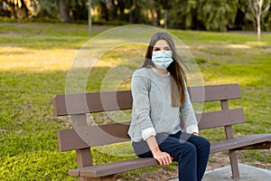 Woman outdoor wearing protective face mask