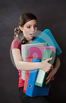 Woman overloaded with work