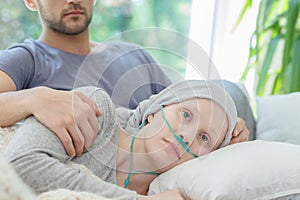 Woman with oxygen nasal cannula photo