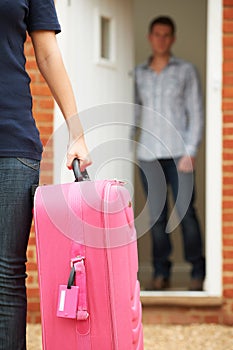 Woman With Packed Suitcase Leaving Husband