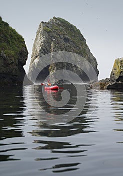 Woman on Packraft in Beautifull Place on Shikotan Island, Lesser Kuril Chain photo