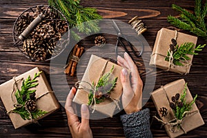 Woman packs Christmas or New Year gift