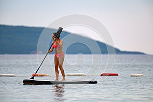 Woman on a paddle board