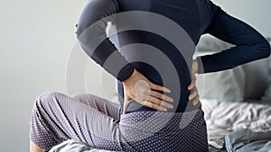 Woman with pain in back