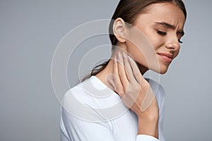 Woman In Pain. Beautiful Girl Feeling Toothache, Jaw, Neck Pain