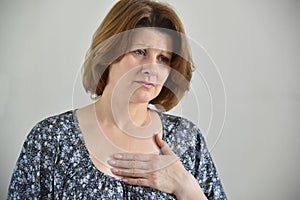 Woman with pain in chest, angina