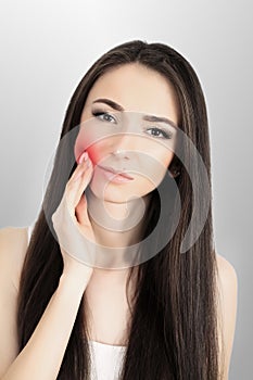 Woman In Pain. Closeup Of Beautiful Young Woman Feeling Painful Toothache, Touching Face With Hand. Sad Stressed Girl Feeling Stro