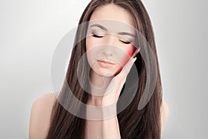 Woman In Pain. Closeup Of Beautiful Young Woman Feeling Painful Toothache, Touching Face With Hand. Sad Stressed Girl Feeling Stro