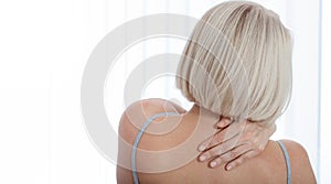 Woman with pain in shoulder. Pain in the human body,health care concept.