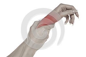 Woman with painful wrist on a white background