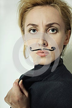 Woman with painted mustache