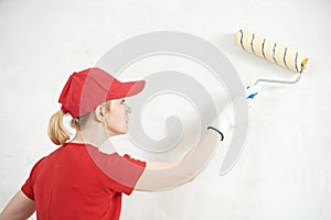 Woman painter at indoor work photo