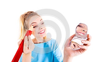 Woman painting eyebrows using regular pencil