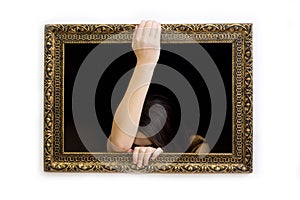 Woman in a painting frame