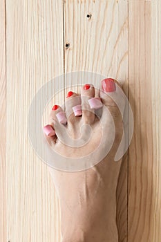 Woman painting toe nails