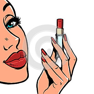 a woman paints her lips with red lipstick, makeup cosmetics