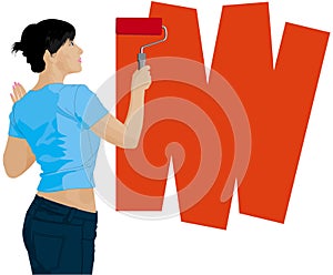 Woman paints a wall